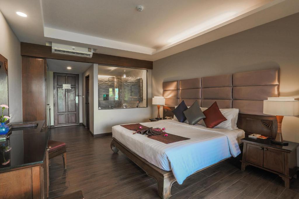 Postel nebo postele na pokoji v ubytování Nora Beach Resort & Spa - SHA Extra Plus