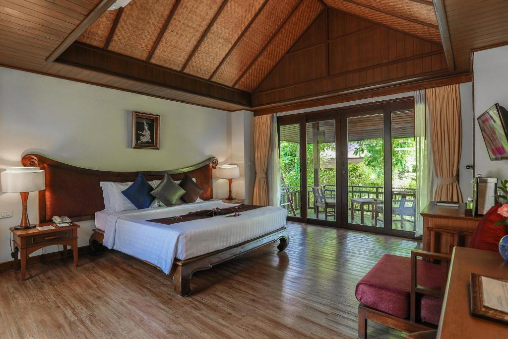 Postel nebo postele na pokoji v ubytování Nora Beach Resort & Spa - SHA Extra Plus