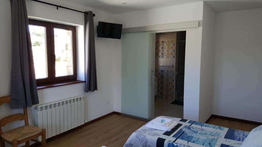 Posteľ alebo postele v izbe v ubytovaní La Posada del Druida