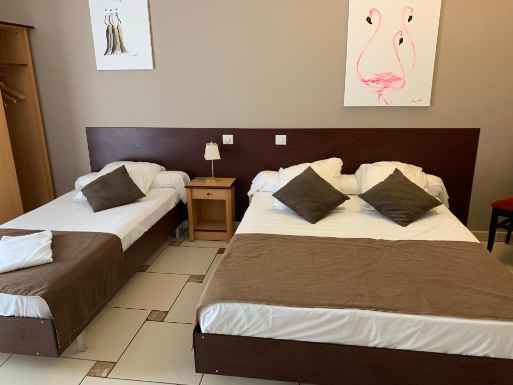 Postel nebo postele na pokoji v ubytování Hôtel restaurant Mon Auberge