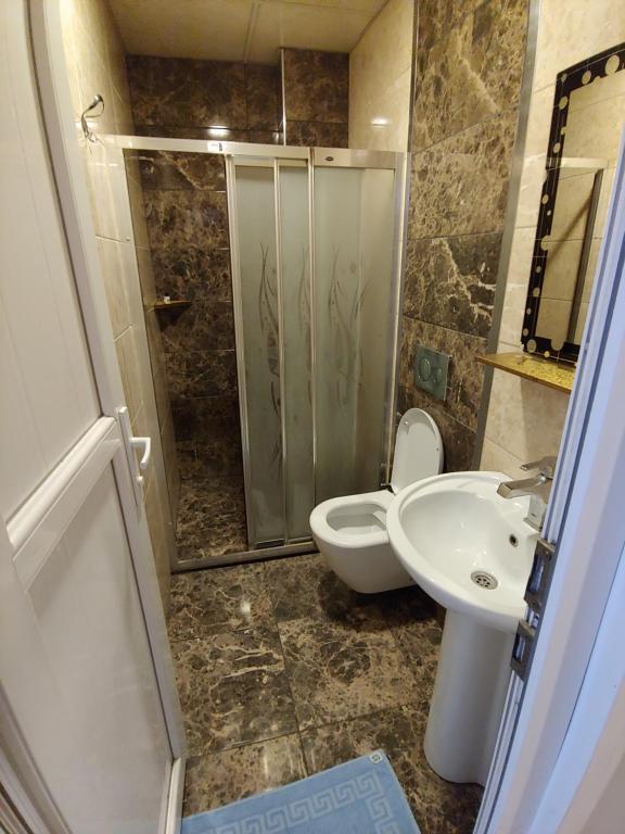 Koupelna v ubytování Hotel Yonca