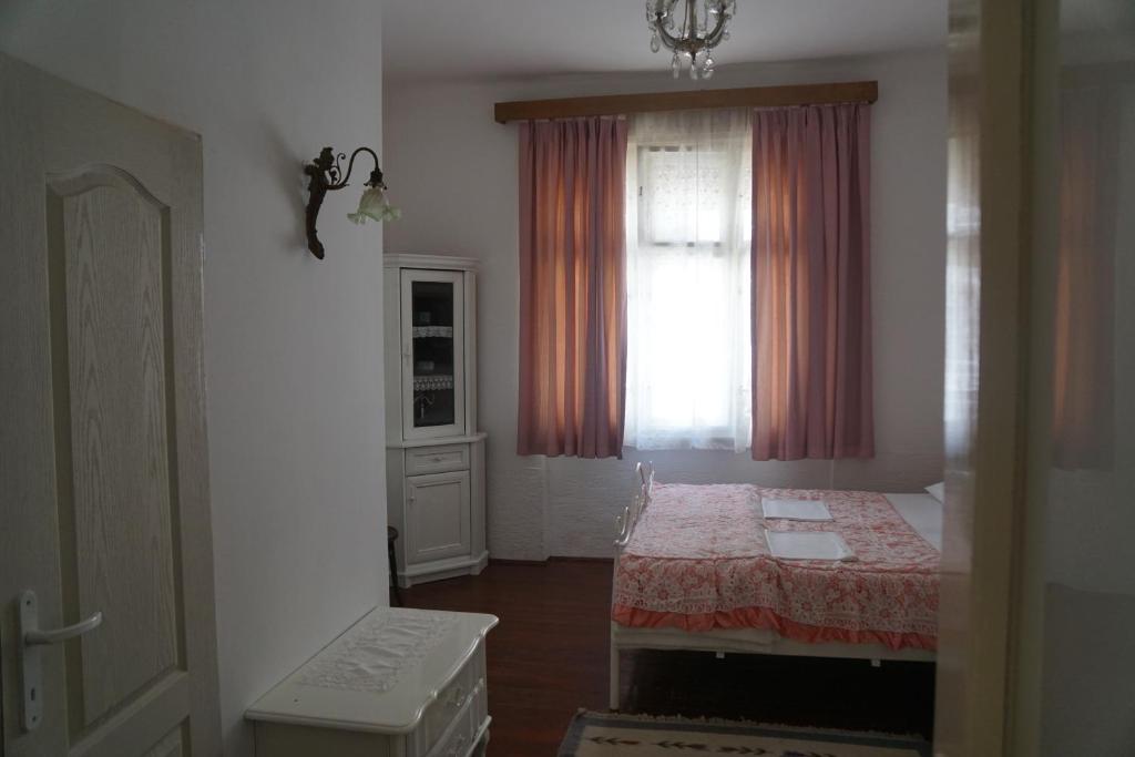 Letto o letti in una camera di Somborski salas - strogi centar