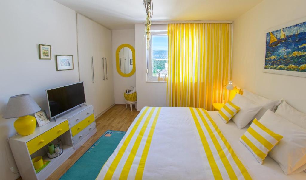 Yellow Lily Mostar Apartman TV 또는 엔터테인먼트 센터