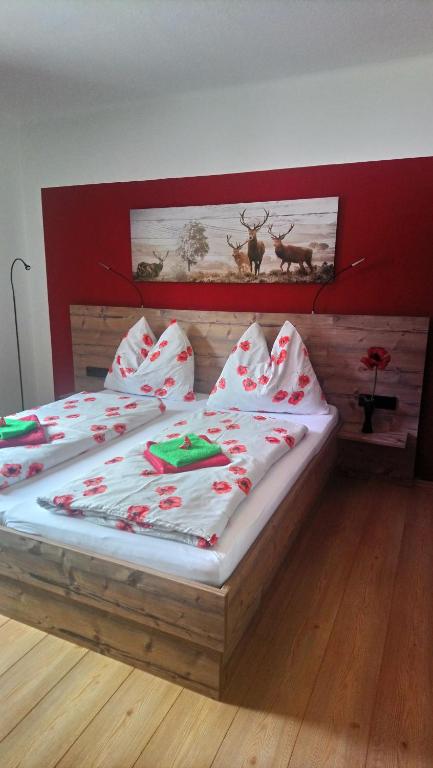 a bedroom with two beds with christmas decorations on them at Haus Wastl in Russbach am Pass Gschütt