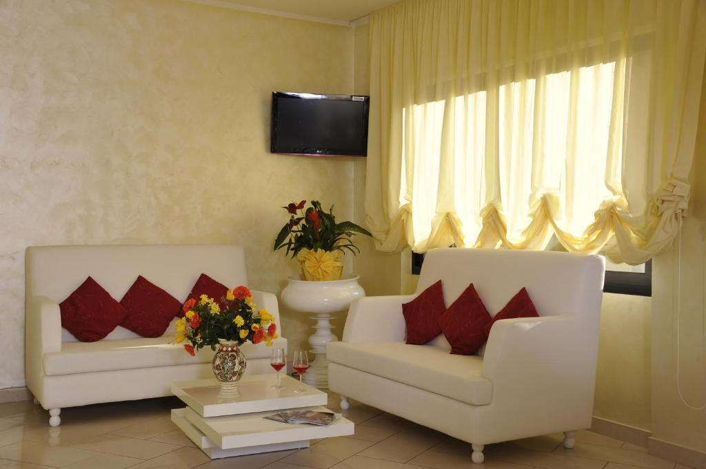 TV a/nebo společenská místnost v ubytování Hotel Fantasy