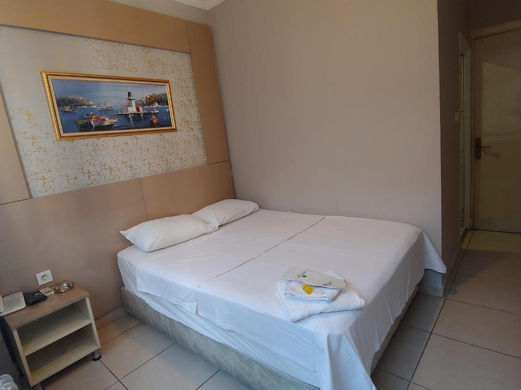Postel nebo postele na pokoji v ubytování Hotel Yonca