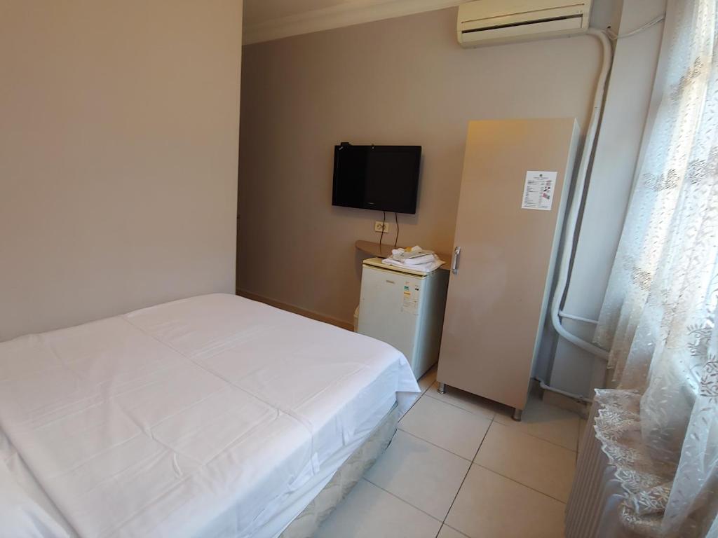 TV a/nebo společenská místnost v ubytování Hotel Yonca