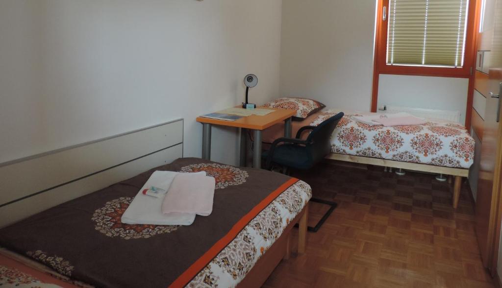 Uma cama ou camas num quarto em Marijin dom - Retreat House