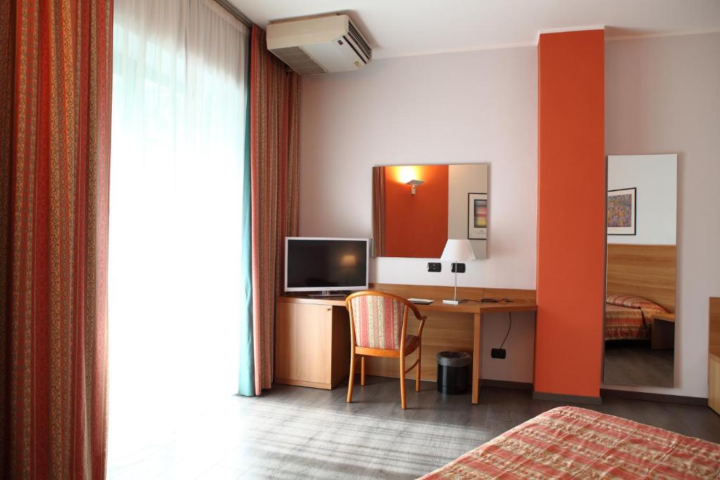 TV a/nebo společenská místnost v ubytování Hotel Romanisio