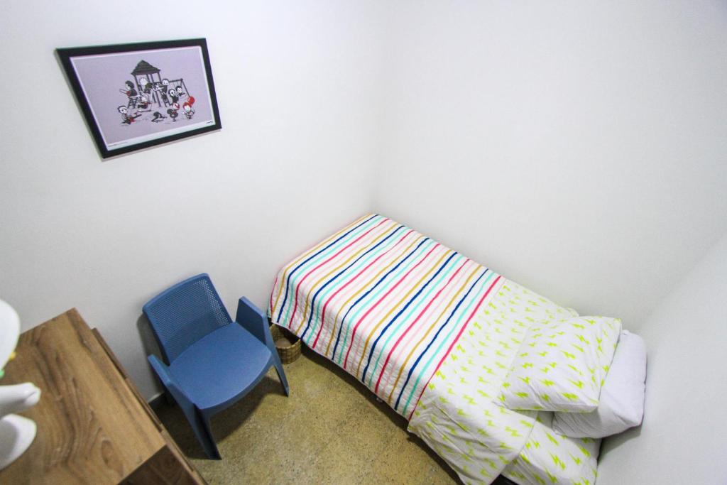 Postel nebo postele na pokoji v ubytování Casa Tuvia