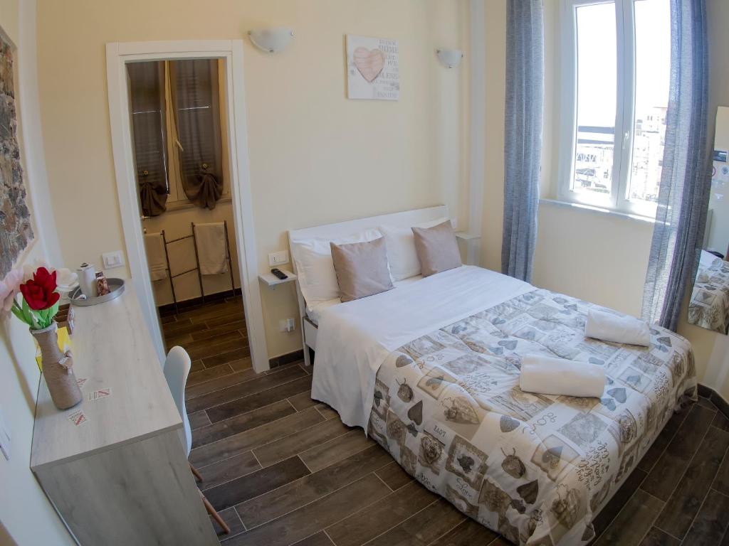 Postel nebo postele na pokoji v ubytování Vicolocorto Affittacamere