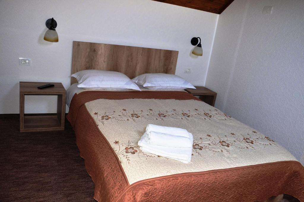 Postel nebo postele na pokoji v ubytování Pensiunea Panoramic
