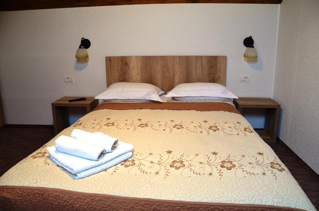 Postel nebo postele na pokoji v ubytování Pensiunea Panoramic