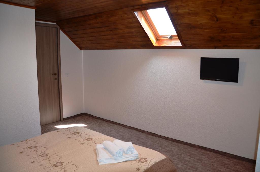 Postel nebo postele na pokoji v ubytování Pensiunea Panoramic