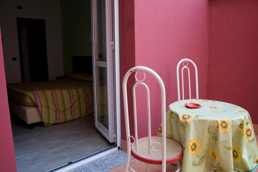 Postel nebo postele na pokoji v ubytování Hotel Renato