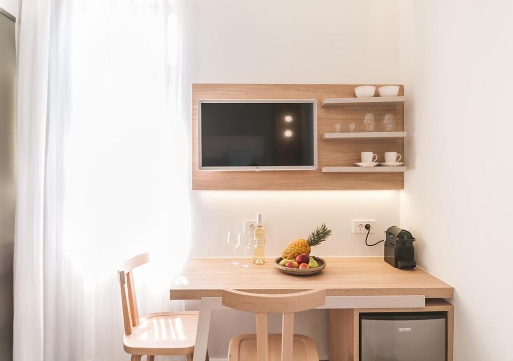 Kuchyň nebo kuchyňský kout v ubytování Epavli Boutique Hotel