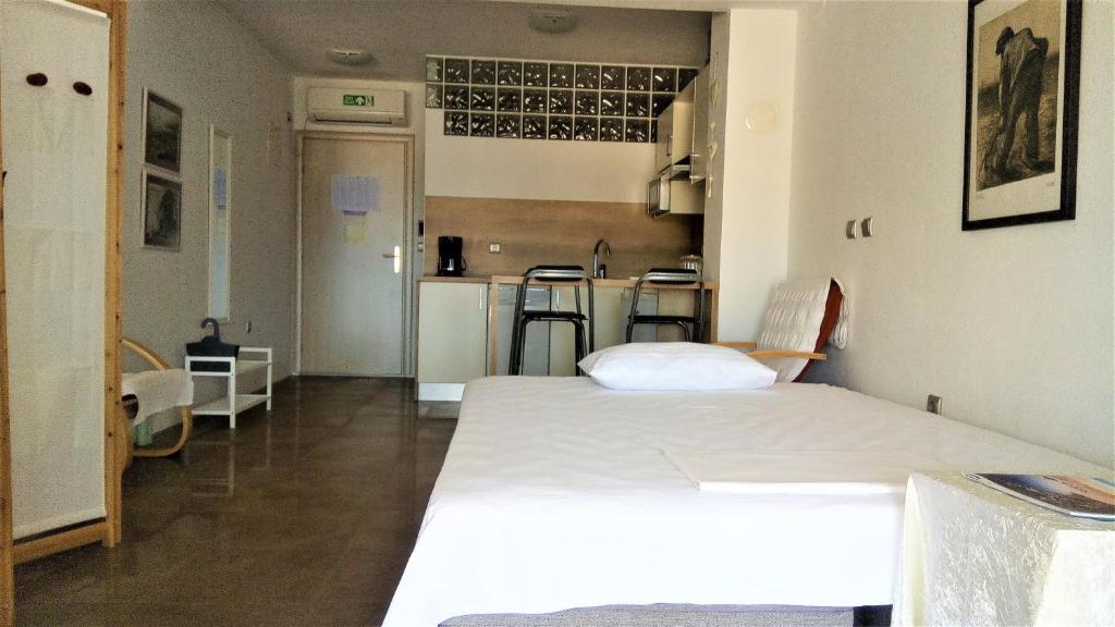 Posteľ alebo postele v izbe v ubytovaní Dalmacija Gradac