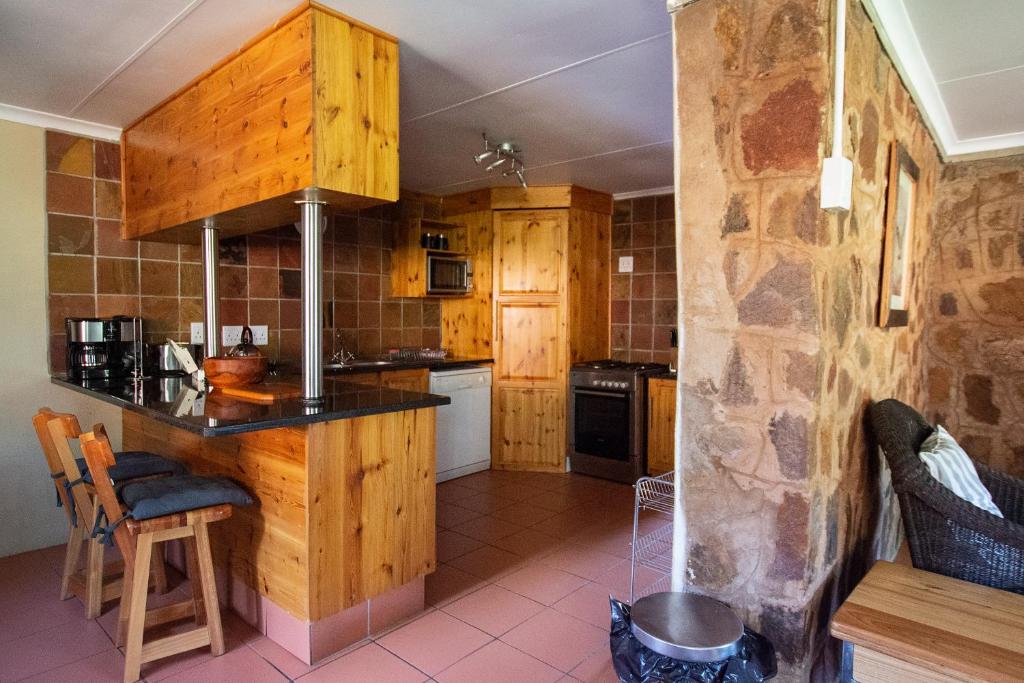 Kuchyň nebo kuchyňský kout v ubytování Milorho Lodge