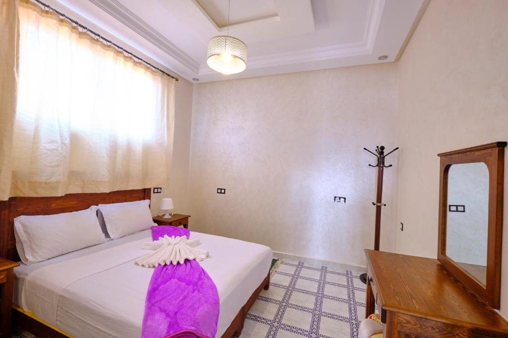 Postel nebo postele na pokoji v ubytování Hotel Central Palace