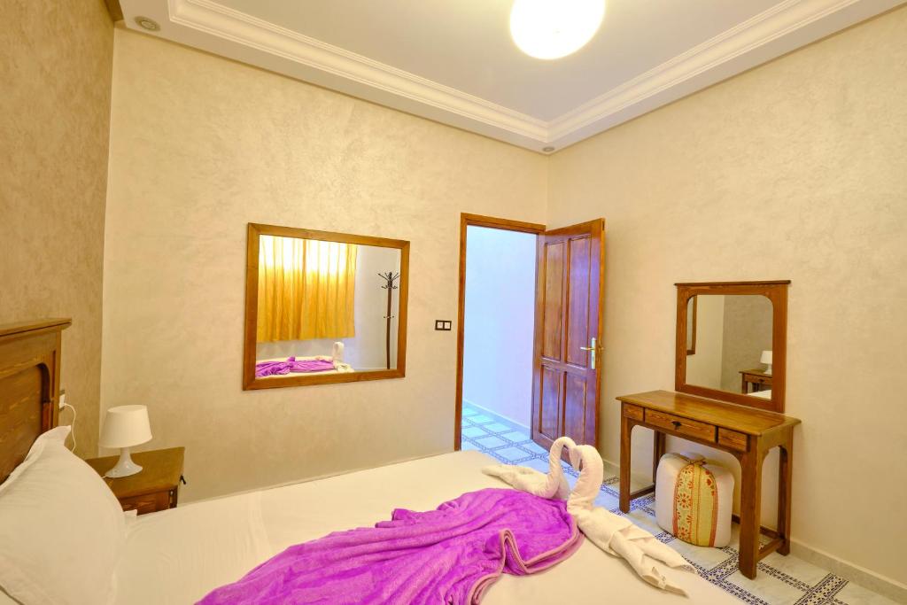 Postel nebo postele na pokoji v ubytování Hotel Central Palace
