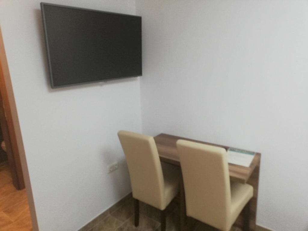 TV a/nebo společenská místnost v ubytování Haus Alexis