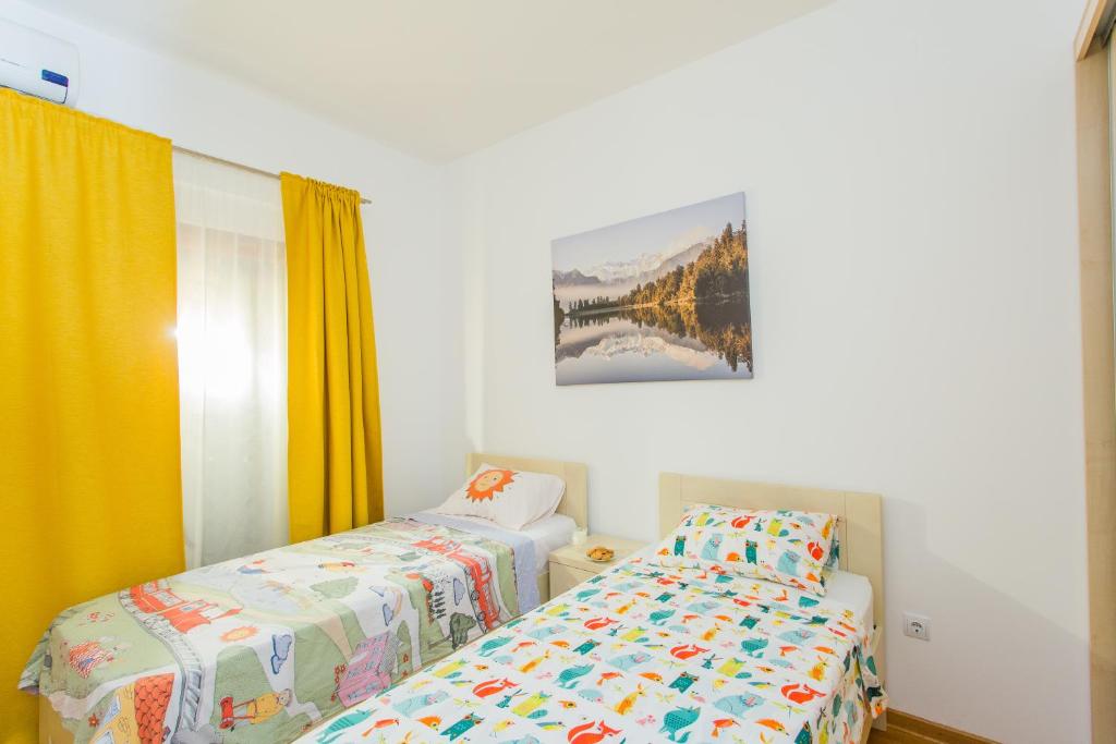 Postel nebo postele na pokoji v ubytování Perla di boka