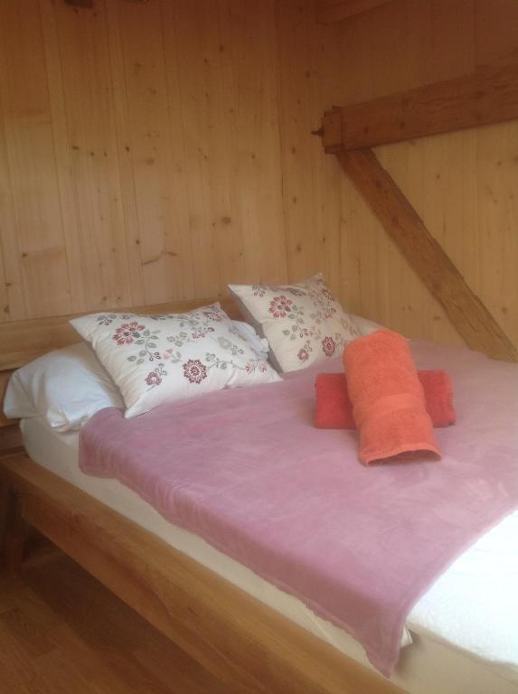 Postel nebo postele na pokoji v ubytování Bois-raiguel chasseral