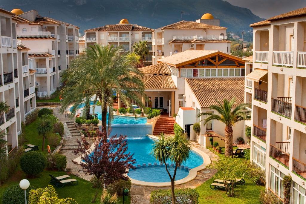 an aerial view of a resort with a swimming pool at Ona Ogisaka Garden in Denia