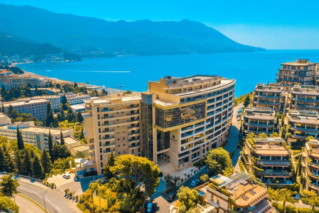 an aerial view of a city with the water at Hotel Harmonia by Dukley in Budva