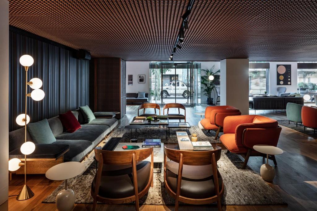 A seating area at Sir Victor Hotel, part of Sircle Collection