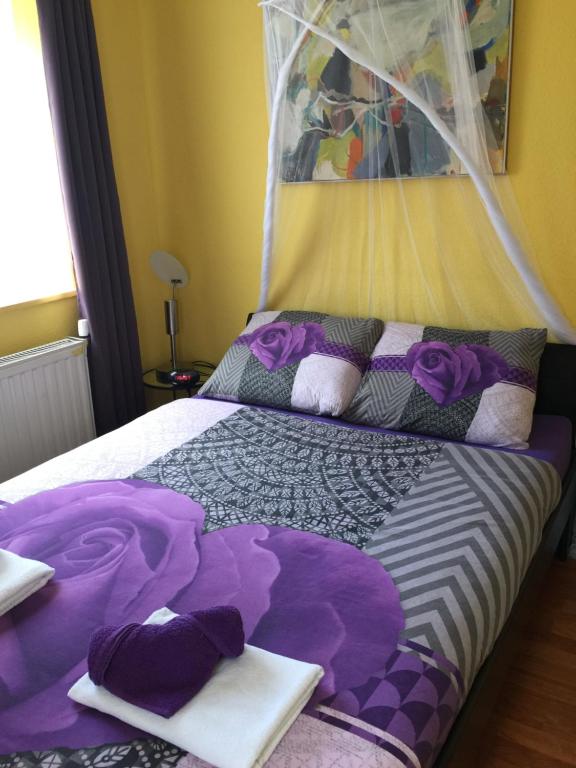Postel nebo postele na pokoji v ubytování Astoria Hotel Heimbach