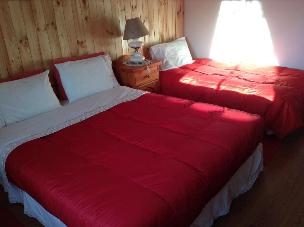 Cama o camas de una habitación en Hostal Monica