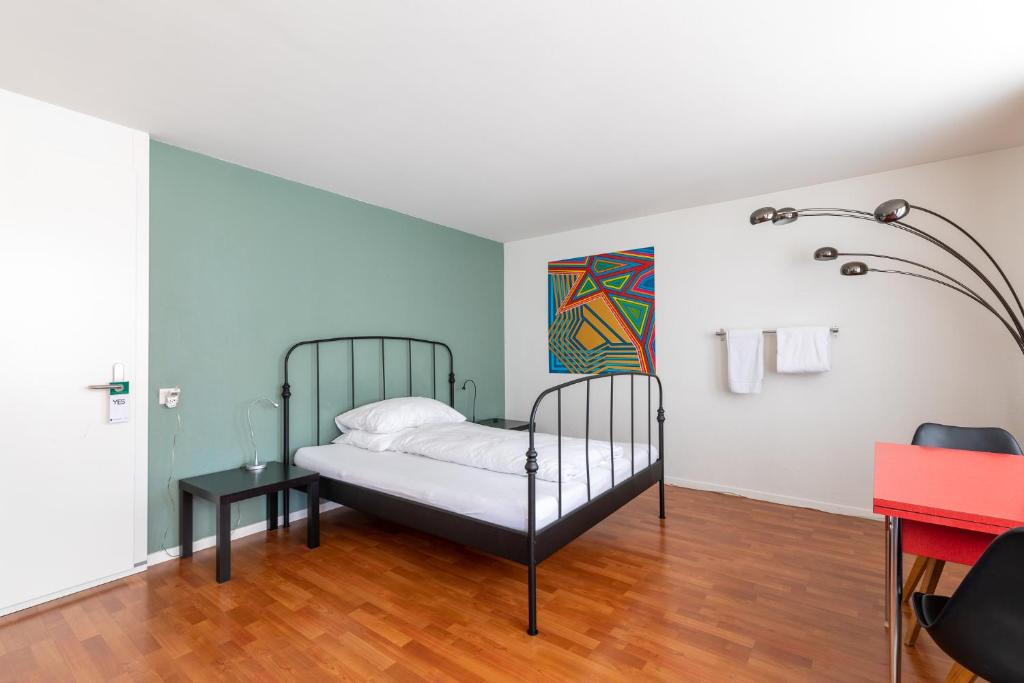 Una cama o camas en una habitación de Bettstatt-Neustadt