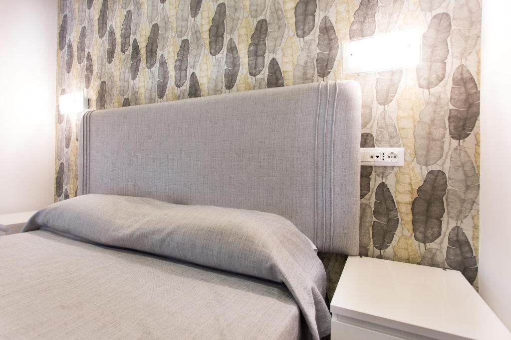 Postel nebo postele na pokoji v ubytování B&B Maria Rosaria
