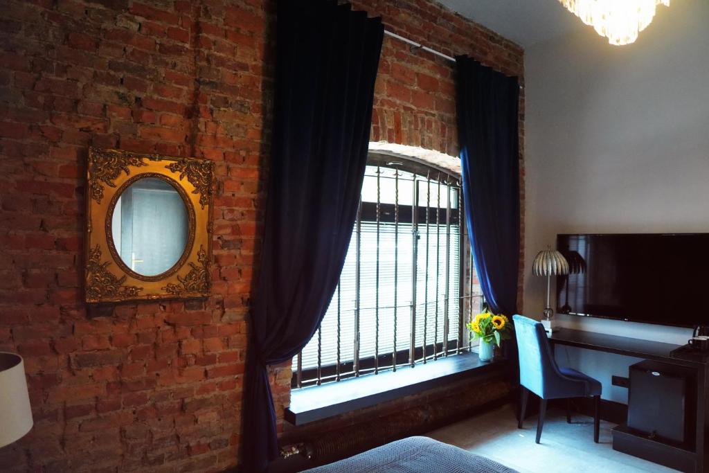 Posteľ alebo postele v izbe v ubytovaní Apartamenty Centrum RS SUITES Kowalska 12