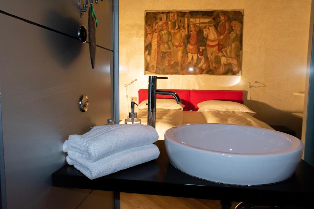 Voodi või voodid majutusasutuse Flora Inn, Flora I - Nel cuore di Bergamo Alta toas
