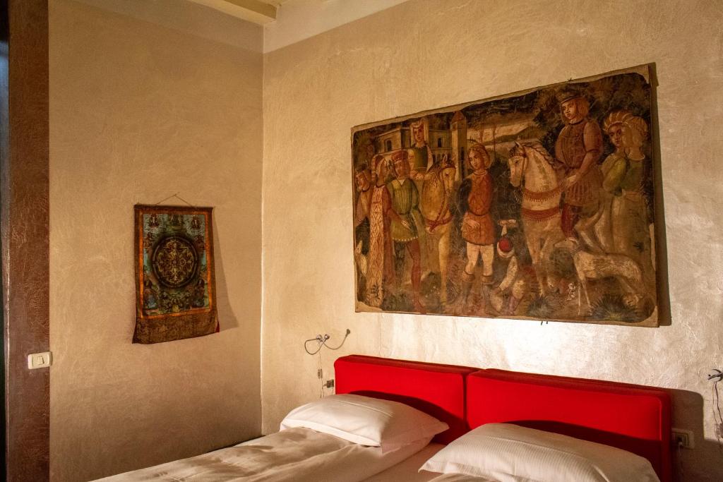 Voodi või voodid majutusasutuse Flora Inn, Flora I - Nel cuore di Bergamo Alta toas