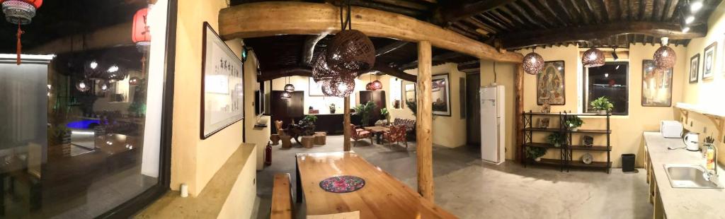 Fotografie z fotogalerie ubytování Guixu Huatang Homestay v destinaci Čchin-chuang-tao