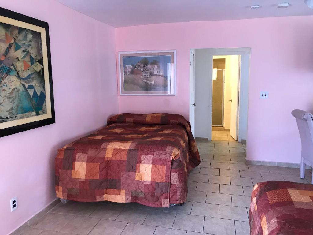 Postel nebo postele na pokoji v ubytování El Ray Motel