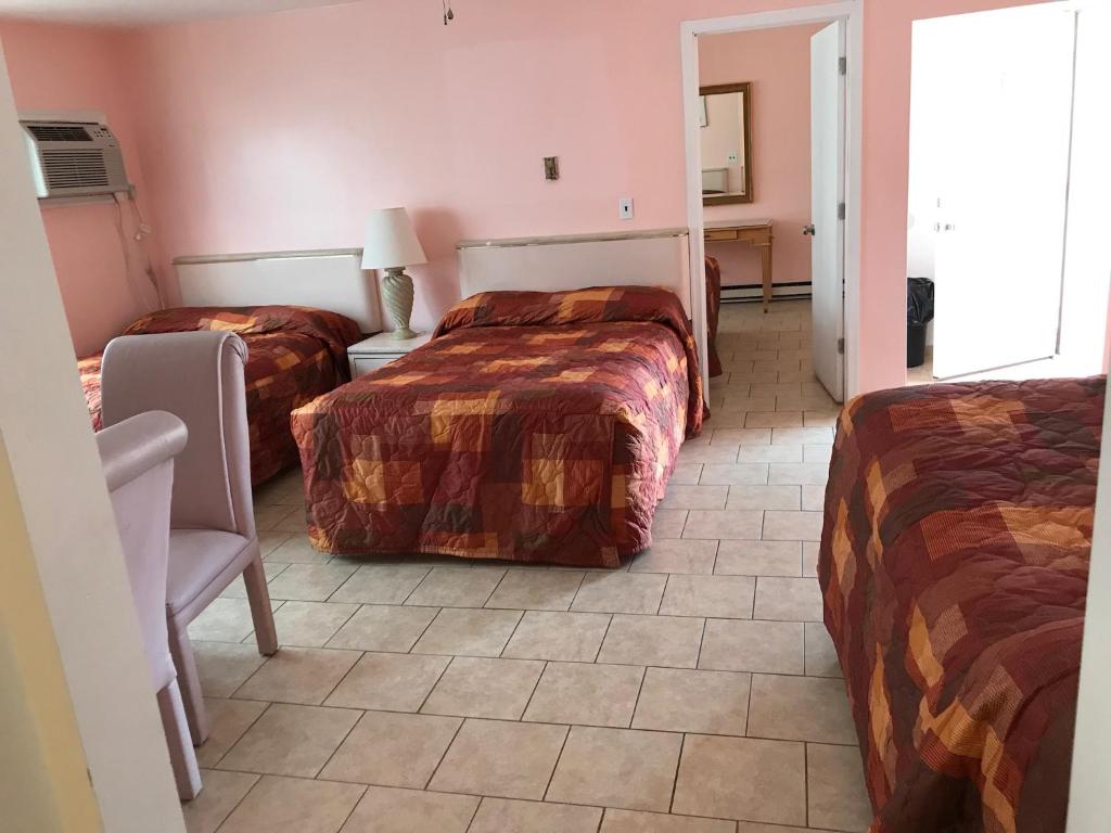 Postel nebo postele na pokoji v ubytování El Ray Motel