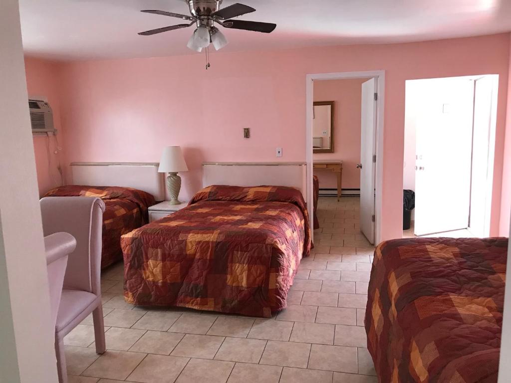 Postel nebo postele na pokoji v ubytování El Ray Motel