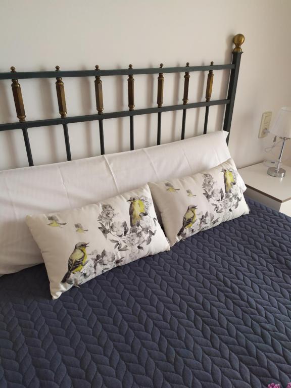 Postel nebo postele na pokoji v ubytování APARTAMENTO VILLA 3