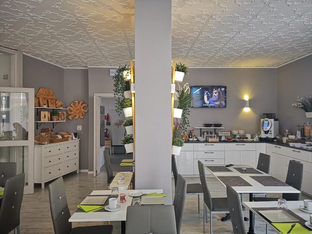 TV a/nebo společenská místnost v ubytování Hotel My Fair