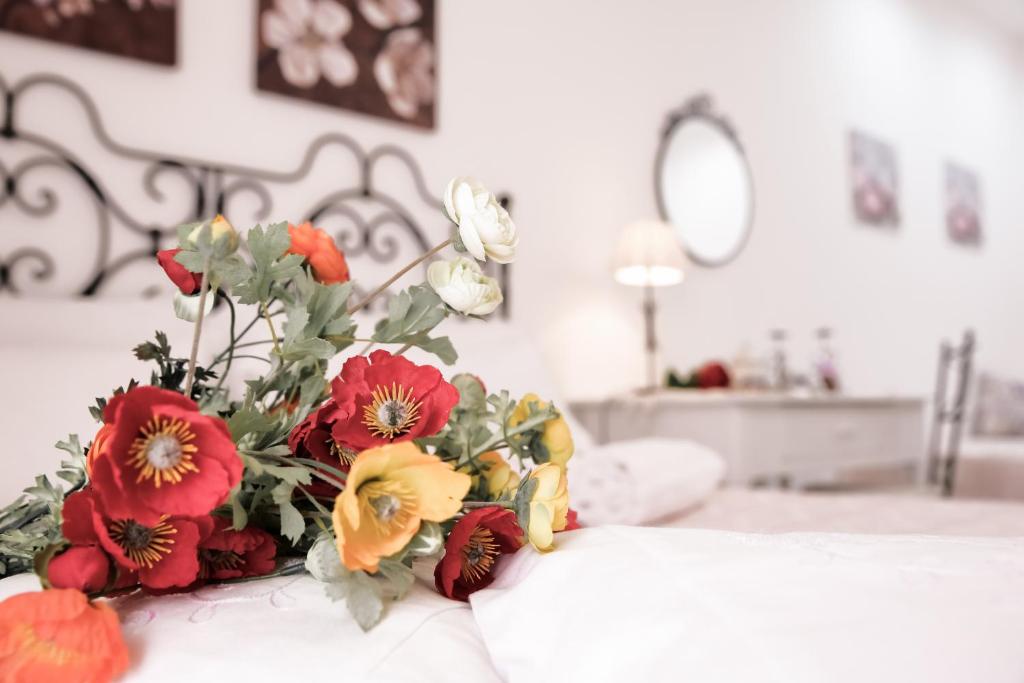 Posteľ alebo postele v izbe v ubytovaní "Suliscenti" Dimora Siciliana B&B