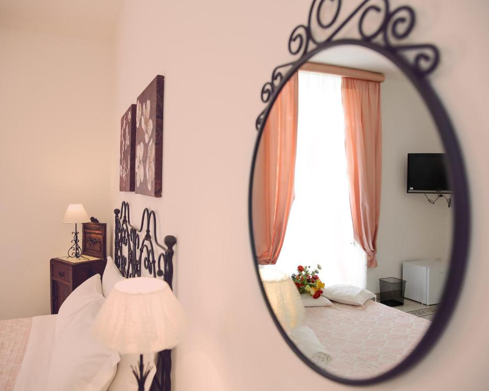 Posteľ alebo postele v izbe v ubytovaní "Suliscenti" Dimora Siciliana B&B