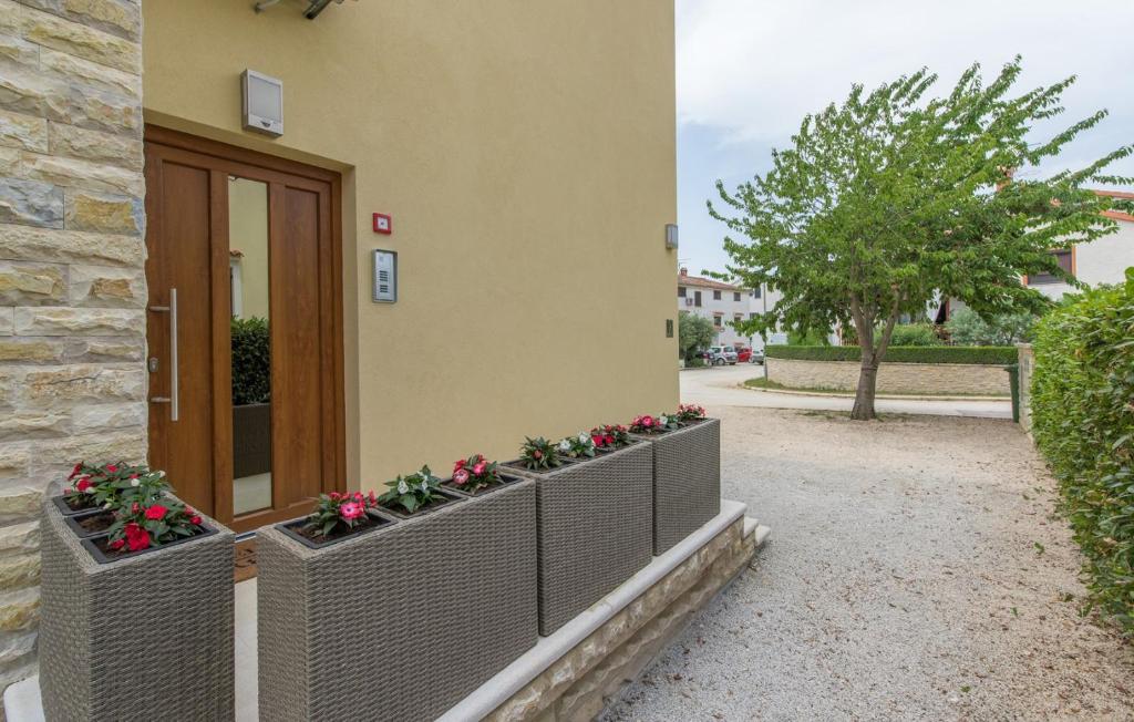 Vonkajšia záhrada v ubytovaní Apartments Hana in Funtana