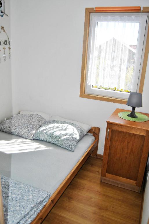 Postel nebo postele na pokoji v ubytování Kwiatu Paproci