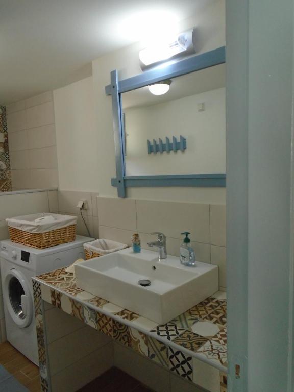 Koupelna v ubytování Kalderimi Home