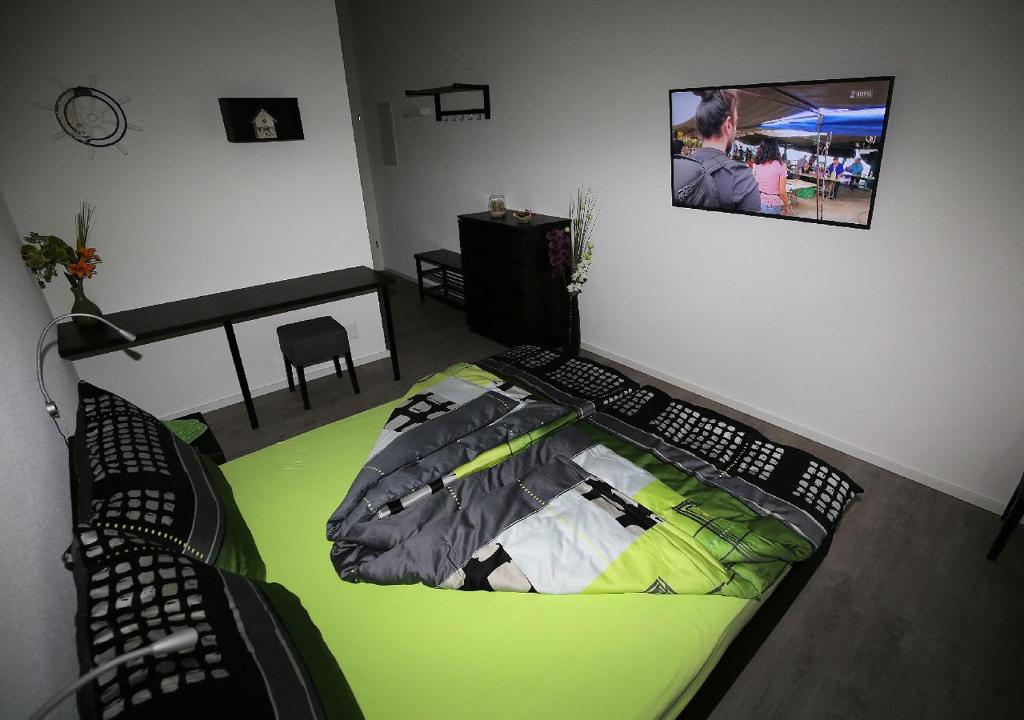 Ein Bett oder Betten in einem Zimmer der Unterkunft BeachIN - Sport, Events, Hotel, Restaurant, Bar