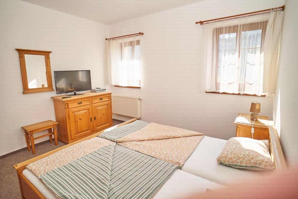 Postel nebo postele na pokoji v ubytování Pension Restaurant Bobrovník